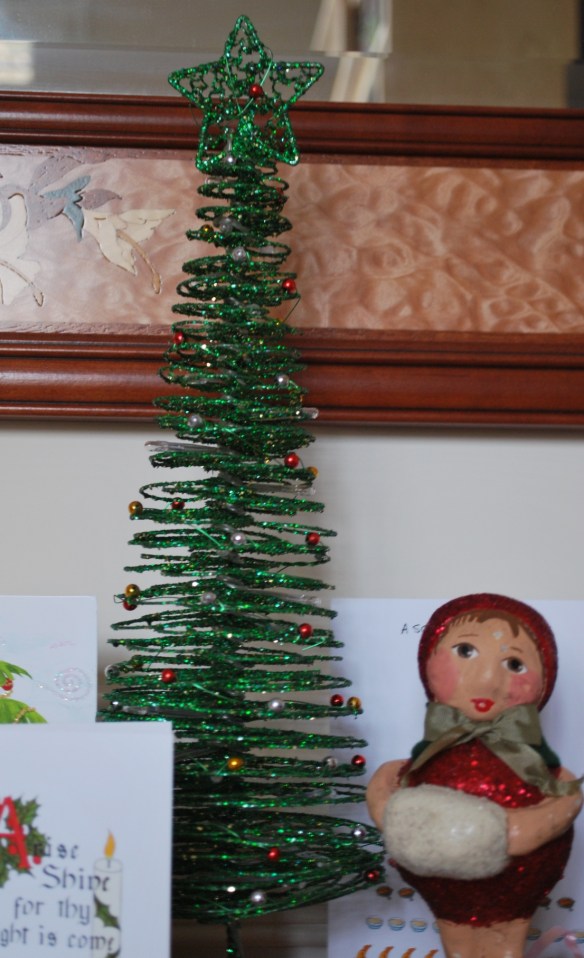 This little green tree decorates the table where we put all our Christmas cards.
