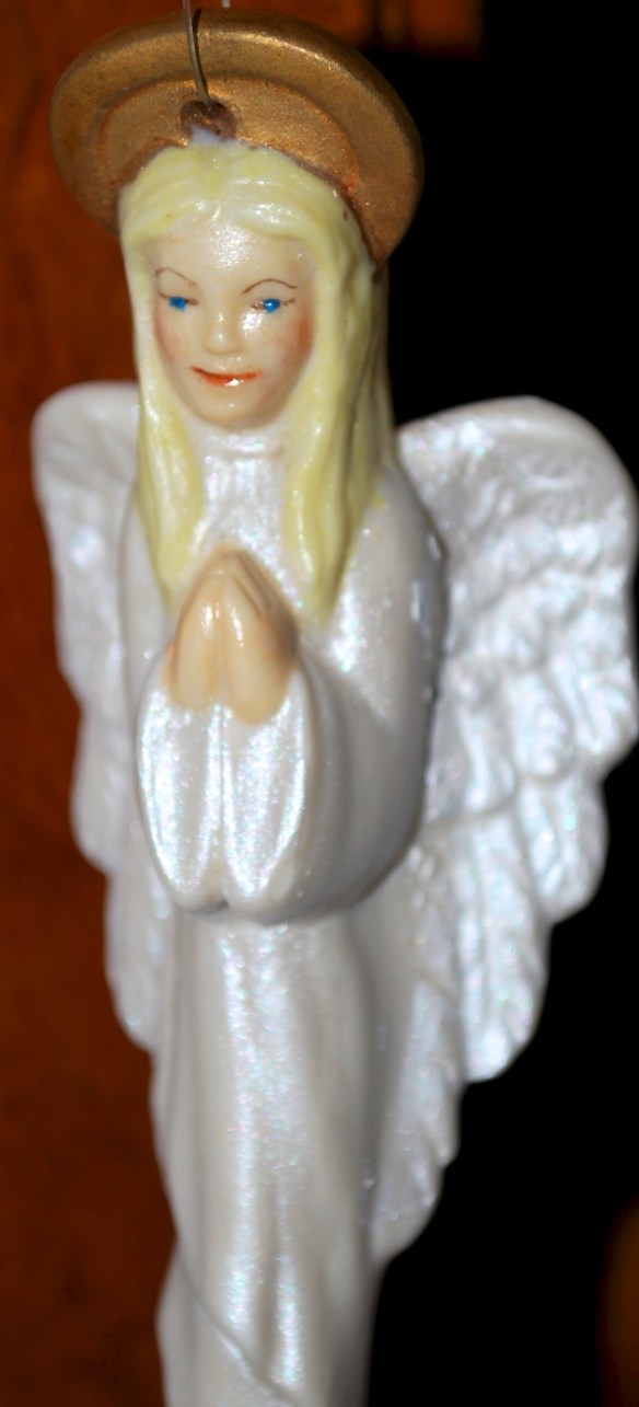 An angel my mother painted, complete with golden halo